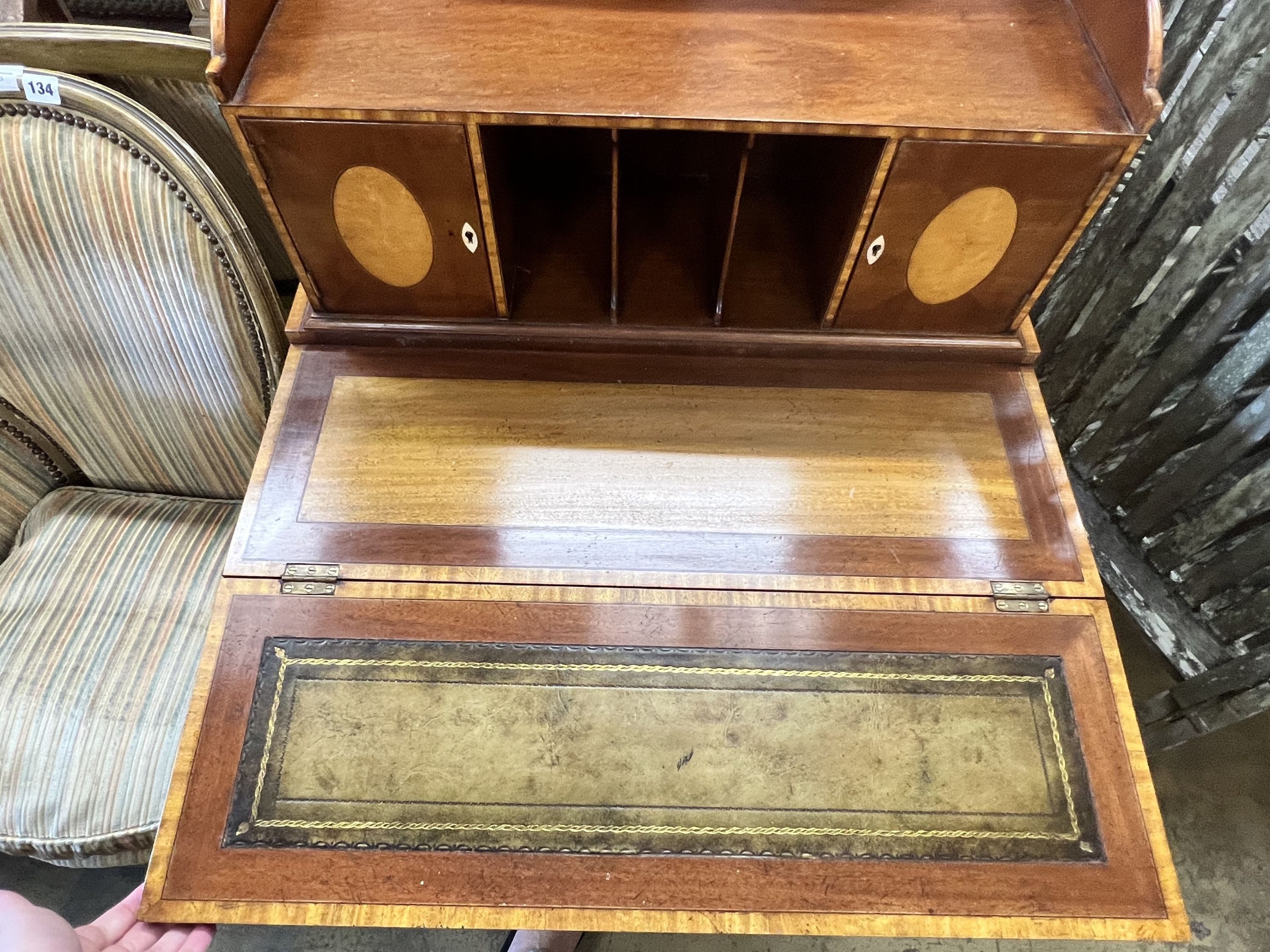 A reproduction Sheraton style crossbanded and satinwood mahogany bonheur du jour, by Arthur Brett, width 63cm depth 43cm height 111cm